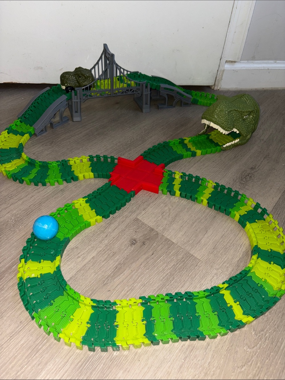 Green Dinosaur-Themed Track Race Set - Flexible Track with Dino Head and Bridge